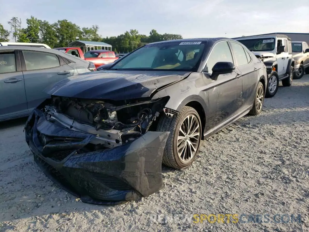 2 Photograph of a damaged car 4T1B11HK8KU802353 TOYOTA CAMRY 2019