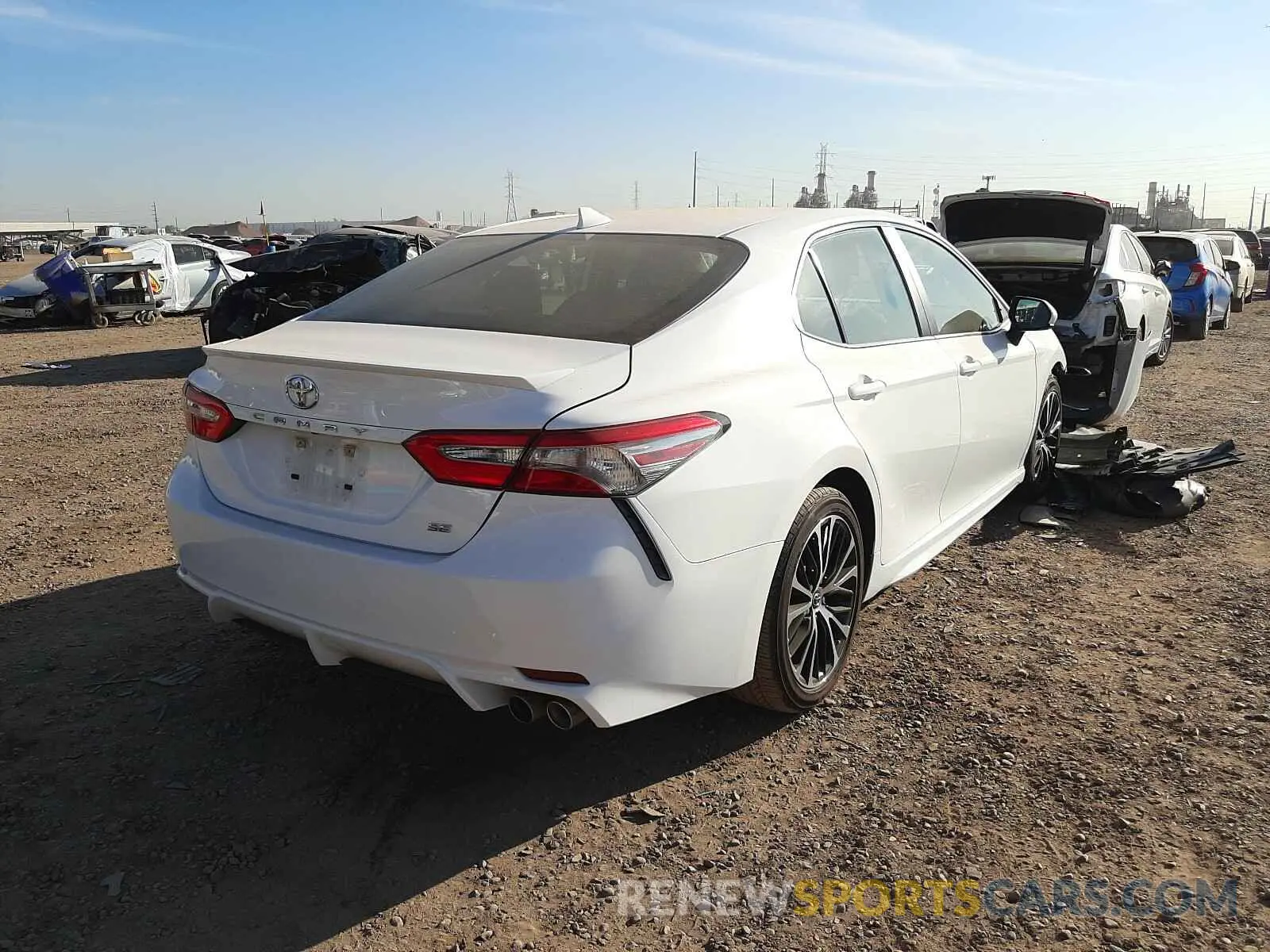 4 Photograph of a damaged car 4T1B11HK9KU202943 TOYOTA CAMRY 2019