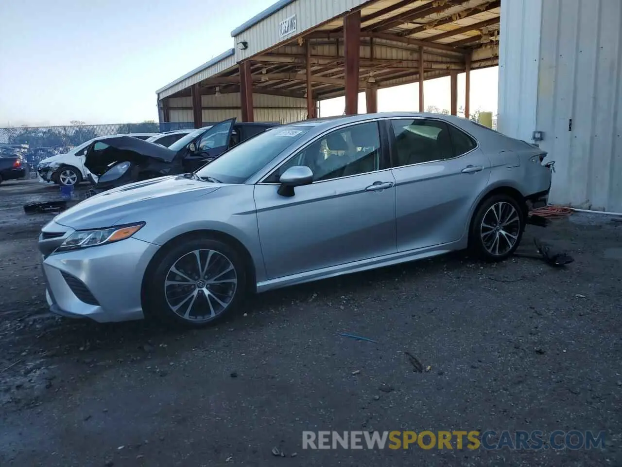1 Photograph of a damaged car 4T1B11HK9KU211707 TOYOTA CAMRY 2019