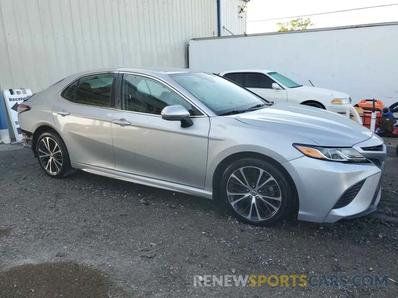 4 Photograph of a damaged car 4T1B11HK9KU211707 TOYOTA CAMRY 2019
