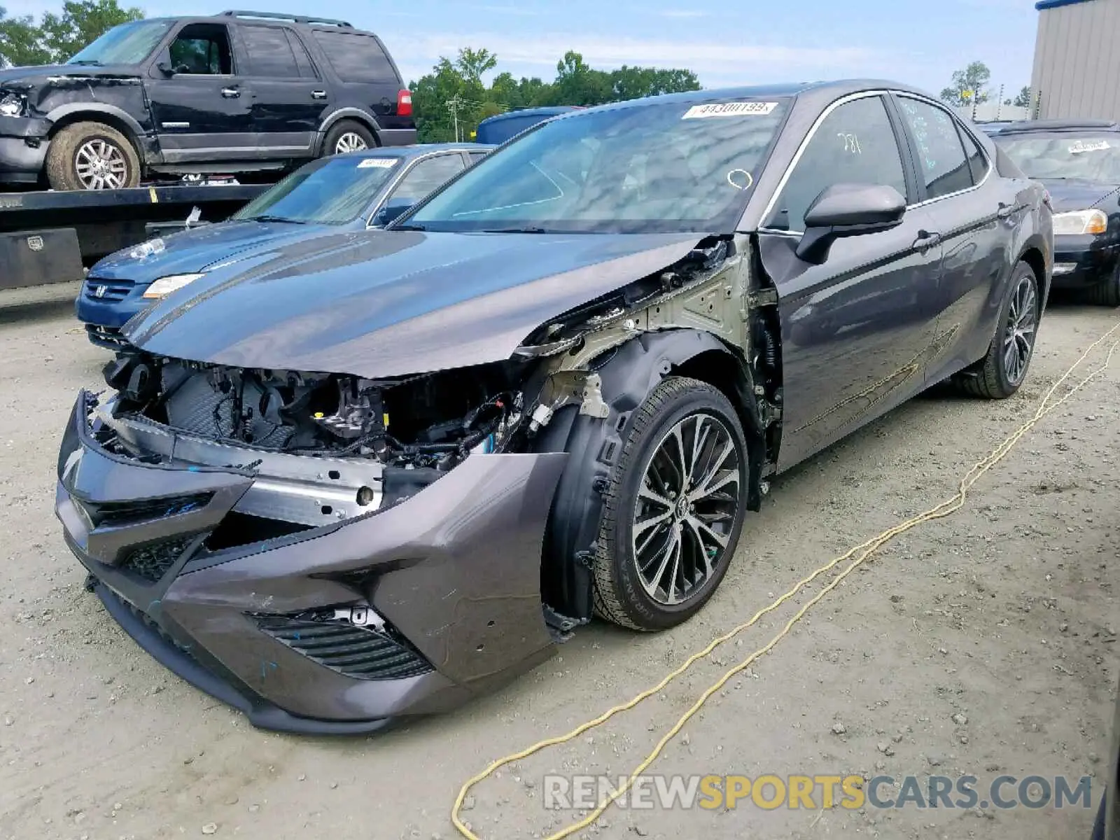2 Photograph of a damaged car 4T1B11HK9KU221928 TOYOTA CAMRY 2019