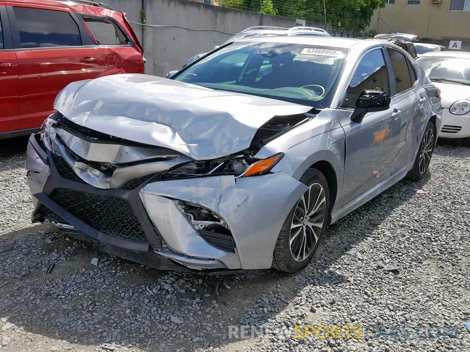 2 Photograph of a damaged car 4T1B11HK9KU223694 TOYOTA CAMRY 2019