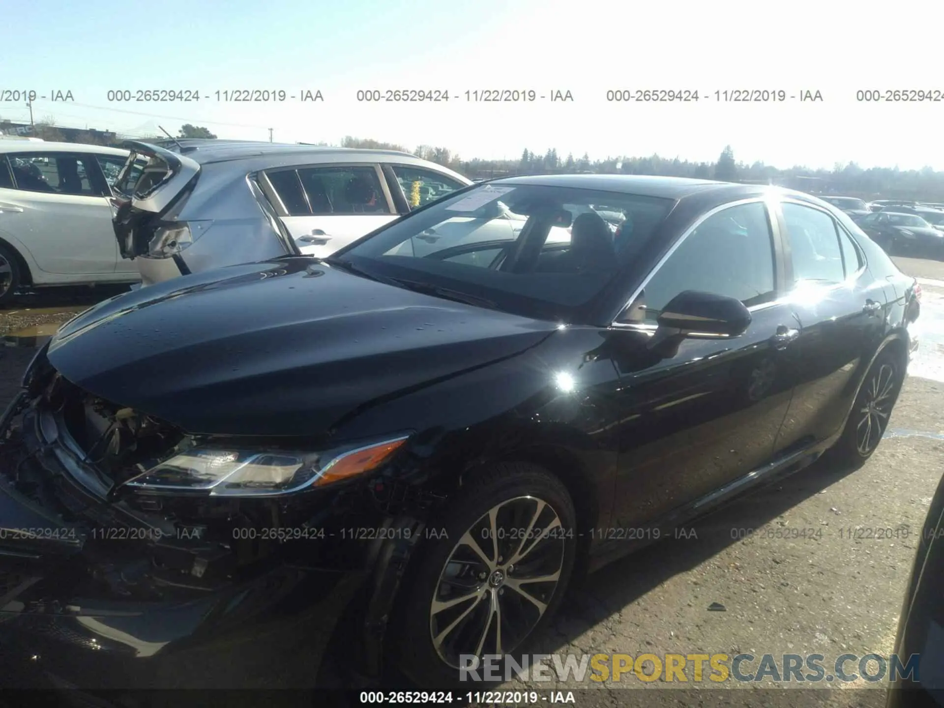 2 Photograph of a damaged car 4T1B11HK9KU283930 TOYOTA CAMRY 2019