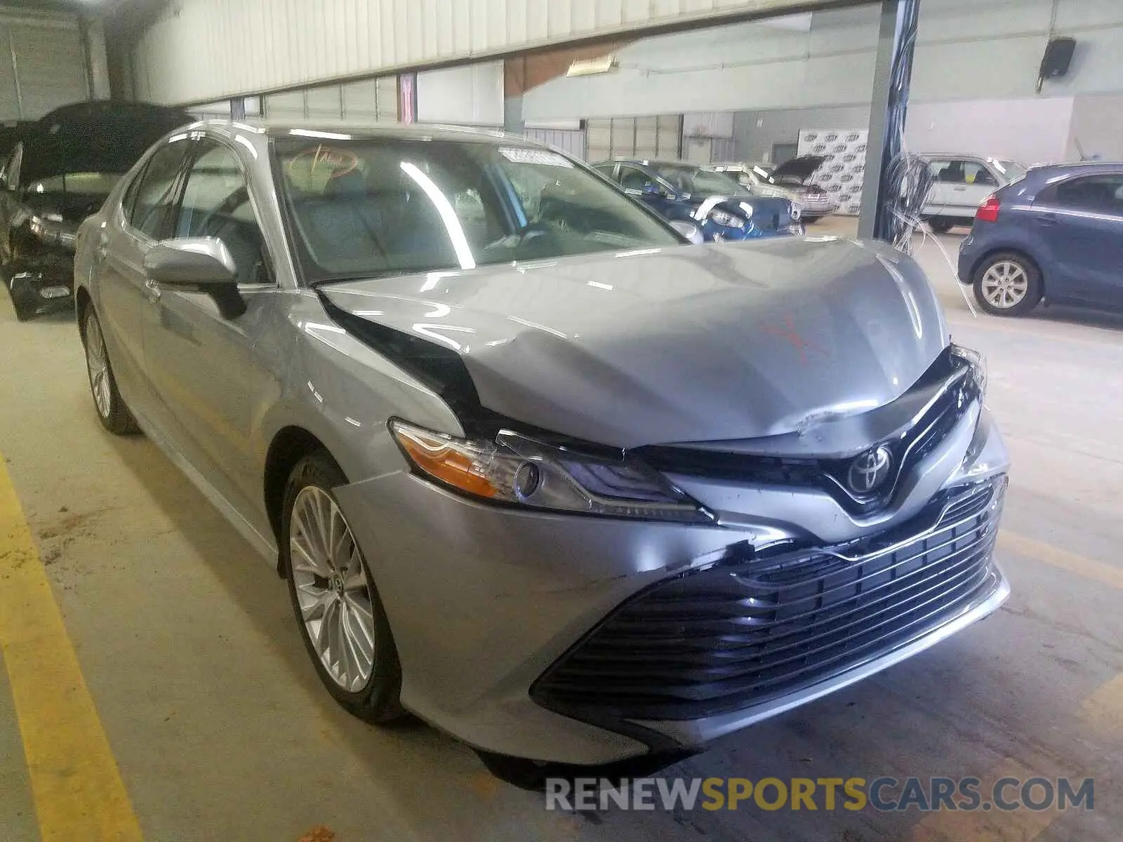 1 Photograph of a damaged car 4T1B11HK9KU711527 TOYOTA CAMRY 2019