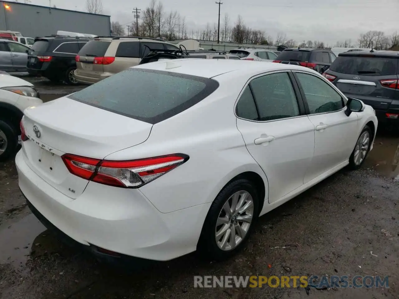 4 Photograph of a damaged car 4T1B11HK9KU787622 TOYOTA CAMRY 2019