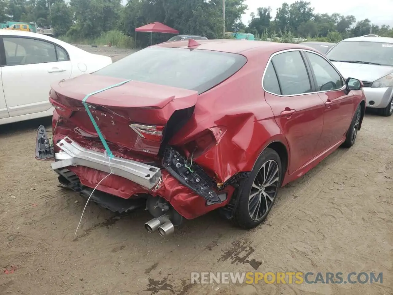 4 Photograph of a damaged car 4T1B11HKXKU181911 TOYOTA CAMRY 2019