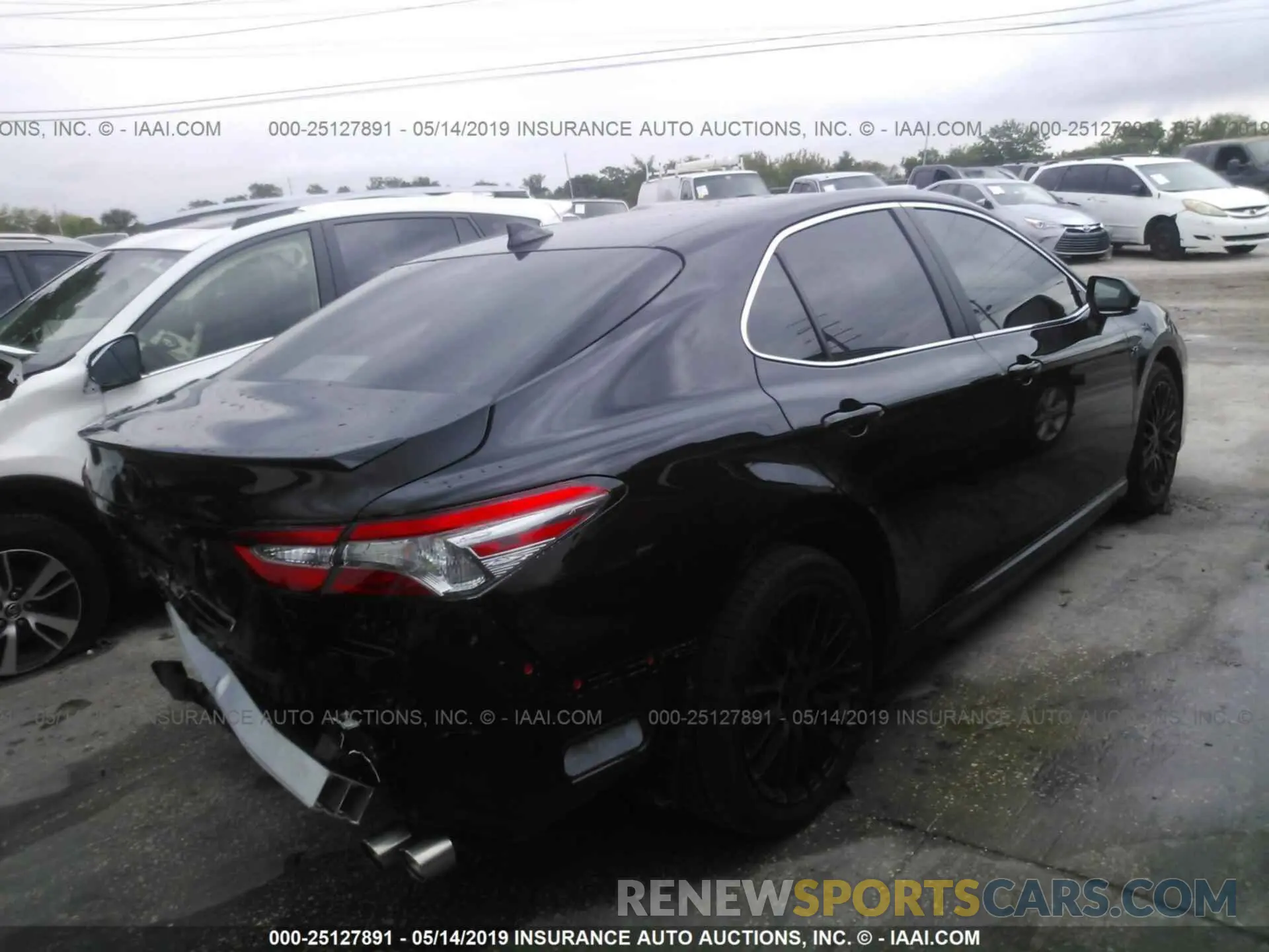 4 Photograph of a damaged car 4T1B11HKXKU185876 TOYOTA CAMRY 2019