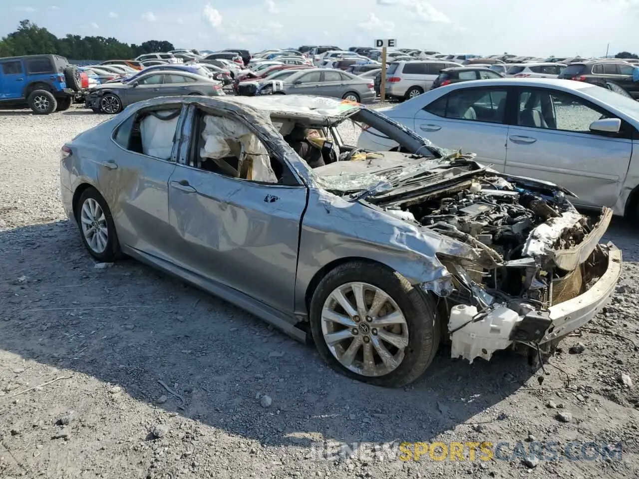 4 Photograph of a damaged car 4T1B11HKXKU230511 TOYOTA CAMRY 2019
