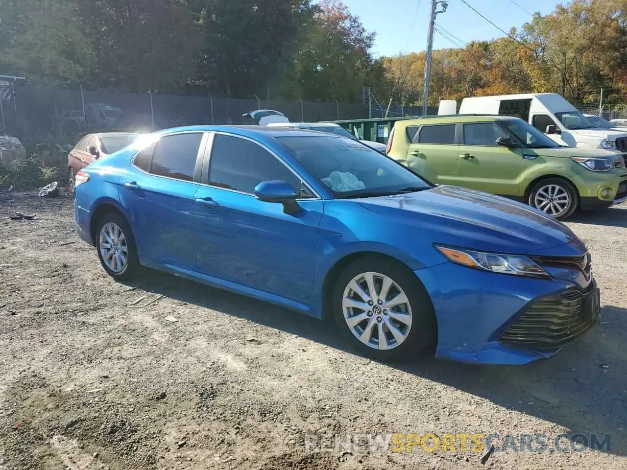 4 Photograph of a damaged car 4T1B11HKXKU256090 TOYOTA CAMRY 2019