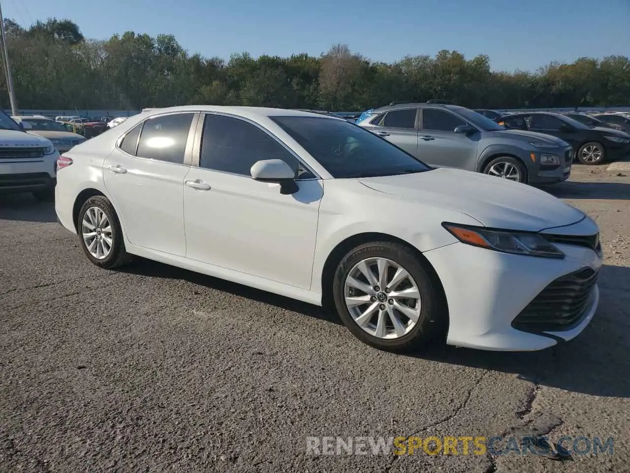 4 Photograph of a damaged car 4T1B11HKXKU261645 TOYOTA CAMRY 2019