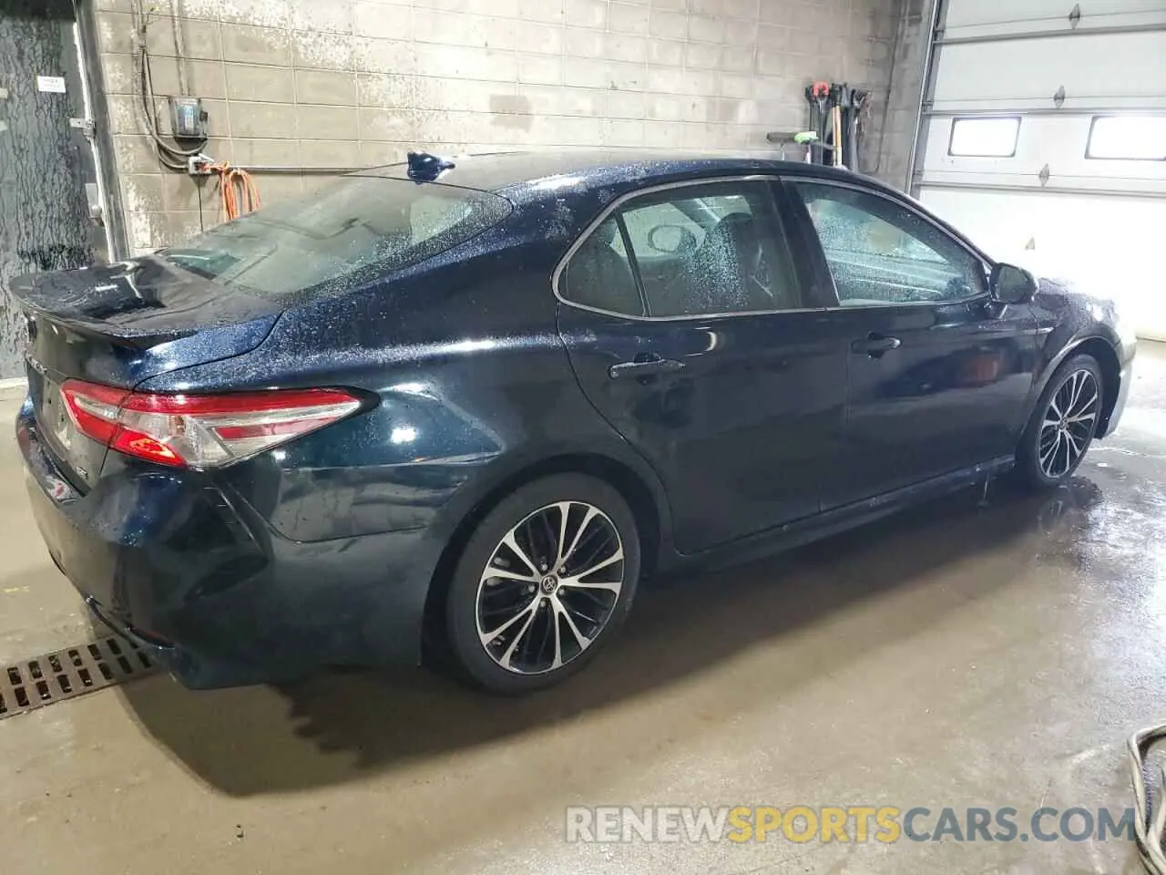 3 Photograph of a damaged car 4T1B11HKXKU694625 TOYOTA CAMRY 2019
