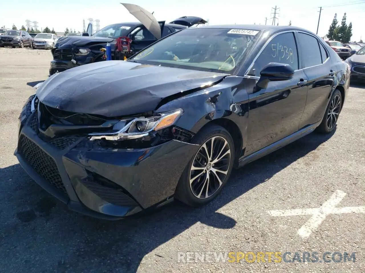 2 Photograph of a damaged car 4T1B11HKXKU750689 TOYOTA CAMRY 2019