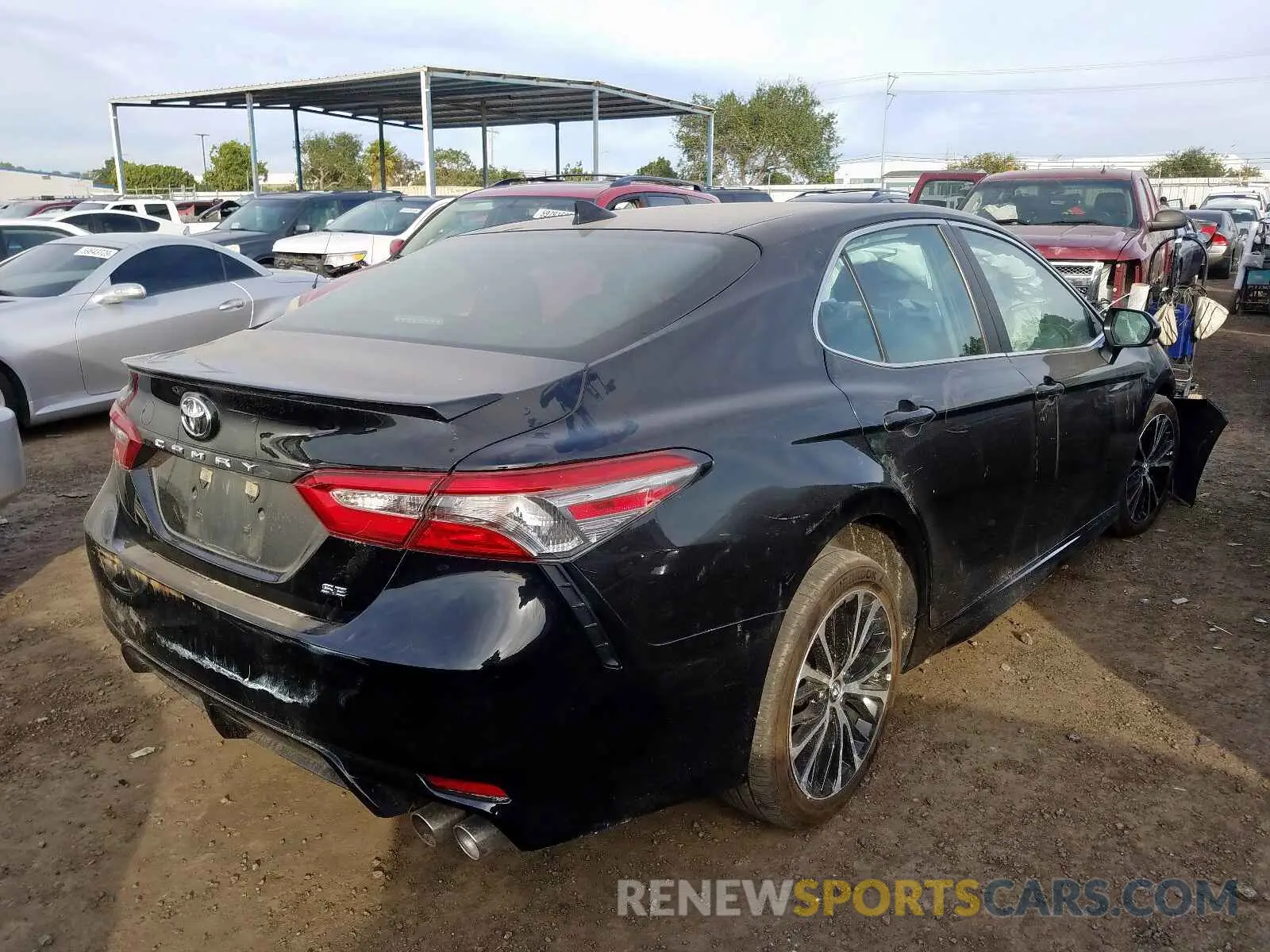 4 Photograph of a damaged car 4T1B11HKXKU771560 TOYOTA CAMRY 2019