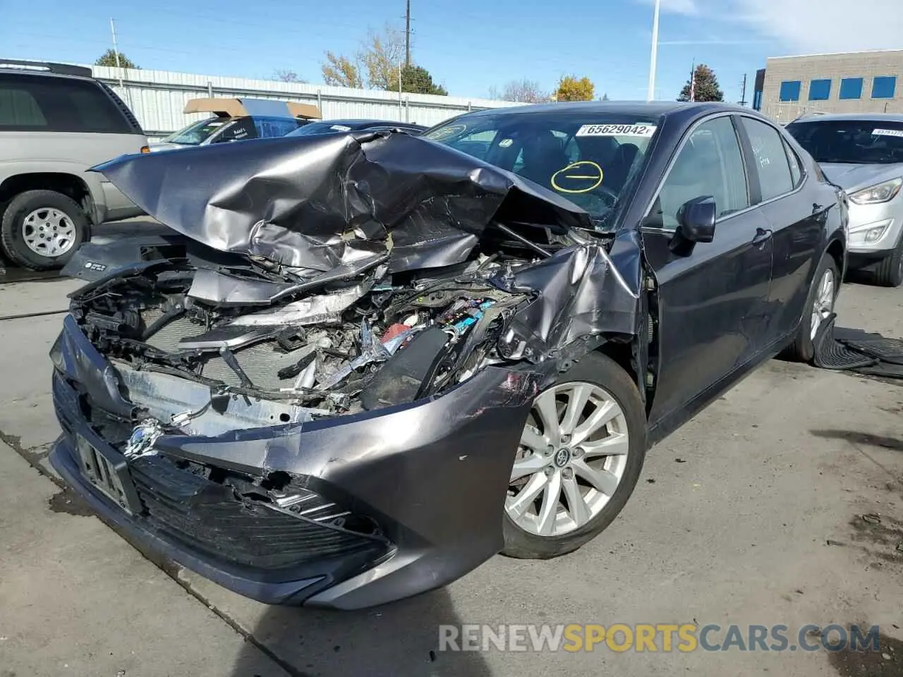 2 Photograph of a damaged car 4T1B11HKXKU779187 TOYOTA CAMRY 2019