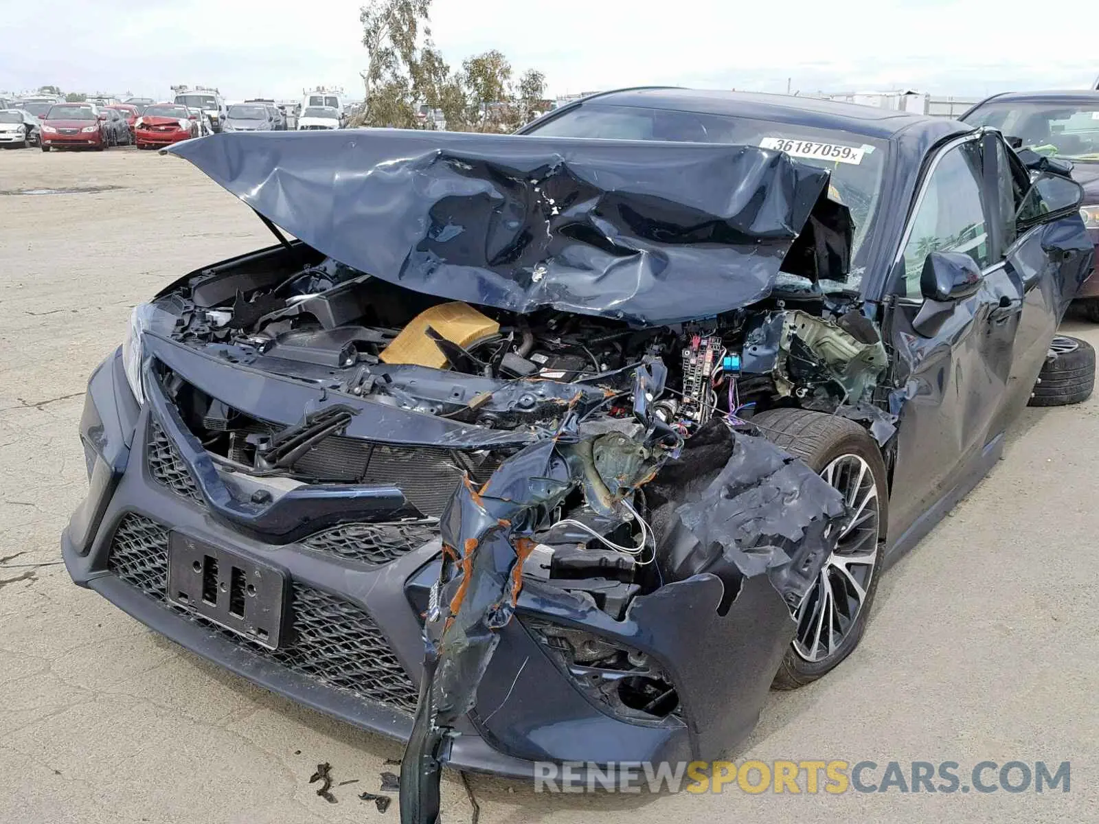2 Photograph of a damaged car 4T1B21HK1KU512596 TOYOTA CAMRY 2019