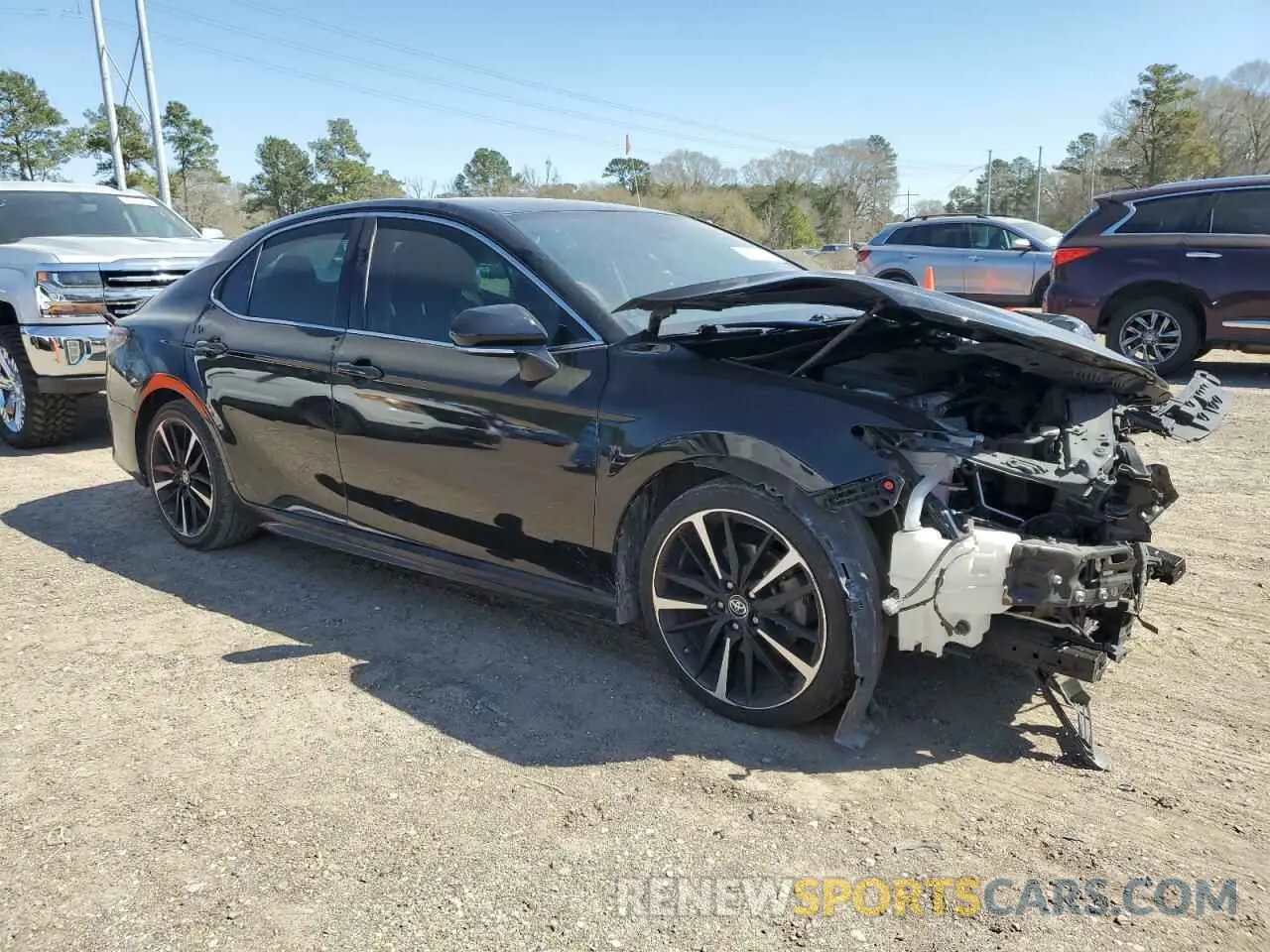 4 Photograph of a damaged car 4T1B61HK0KU770791 TOYOTA CAMRY 2019