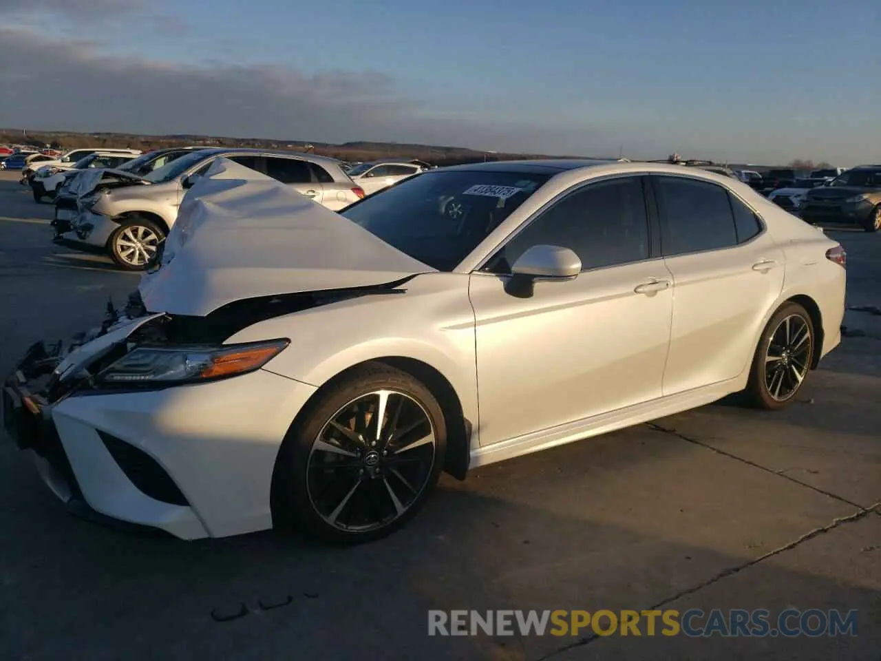1 Photograph of a damaged car 4T1B61HK1KU721275 TOYOTA CAMRY 2019