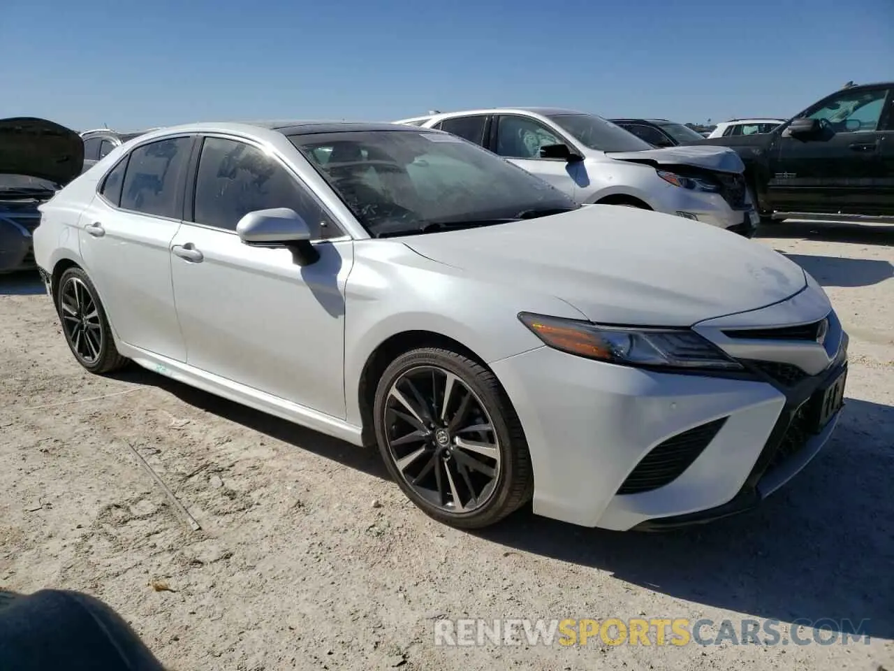 4 Photograph of a damaged car 4T1B61HK1KU743373 TOYOTA CAMRY 2019