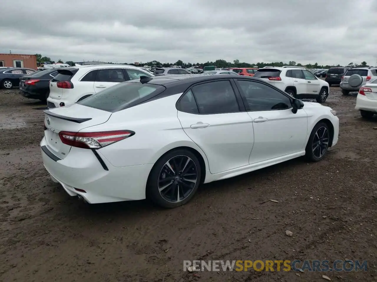 3 Photograph of a damaged car 4T1B61HK2KU209959 TOYOTA CAMRY 2019