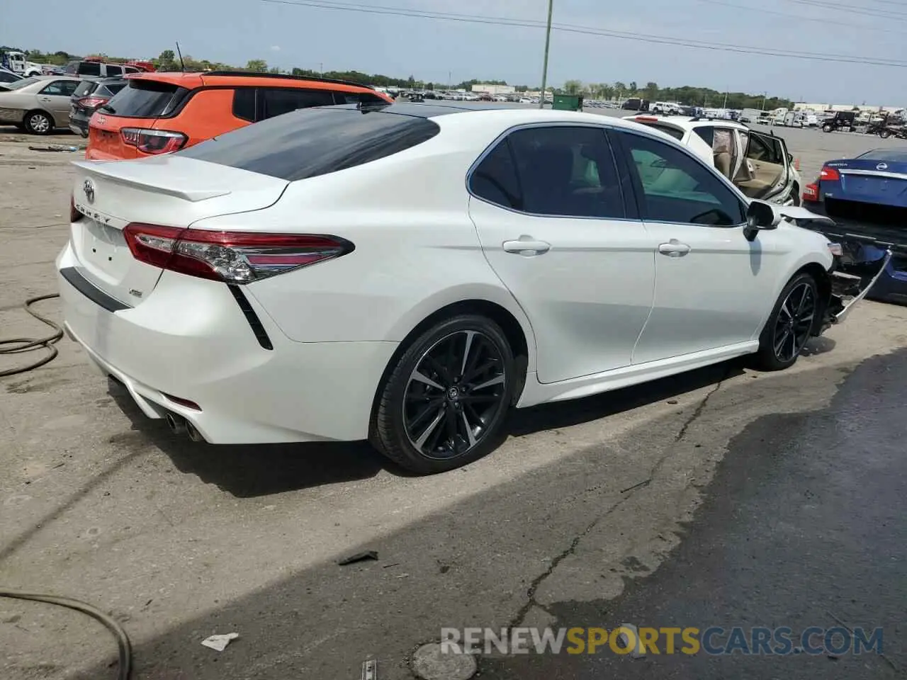 3 Photograph of a damaged car 4T1B61HK2KU797183 TOYOTA CAMRY 2019