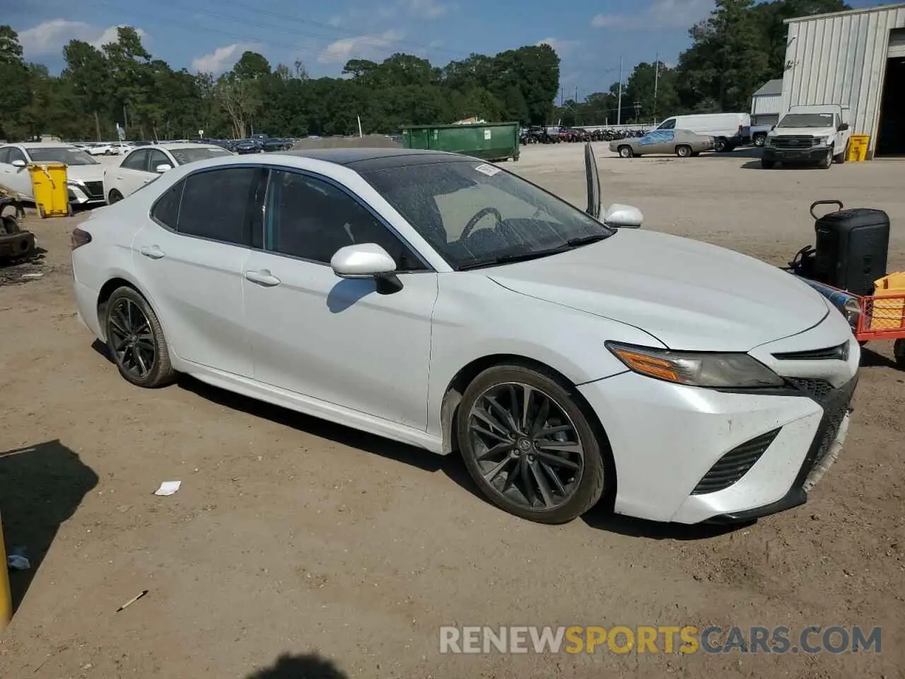 4 Photograph of a damaged car 4T1B61HK4KU702932 TOYOTA CAMRY 2019
