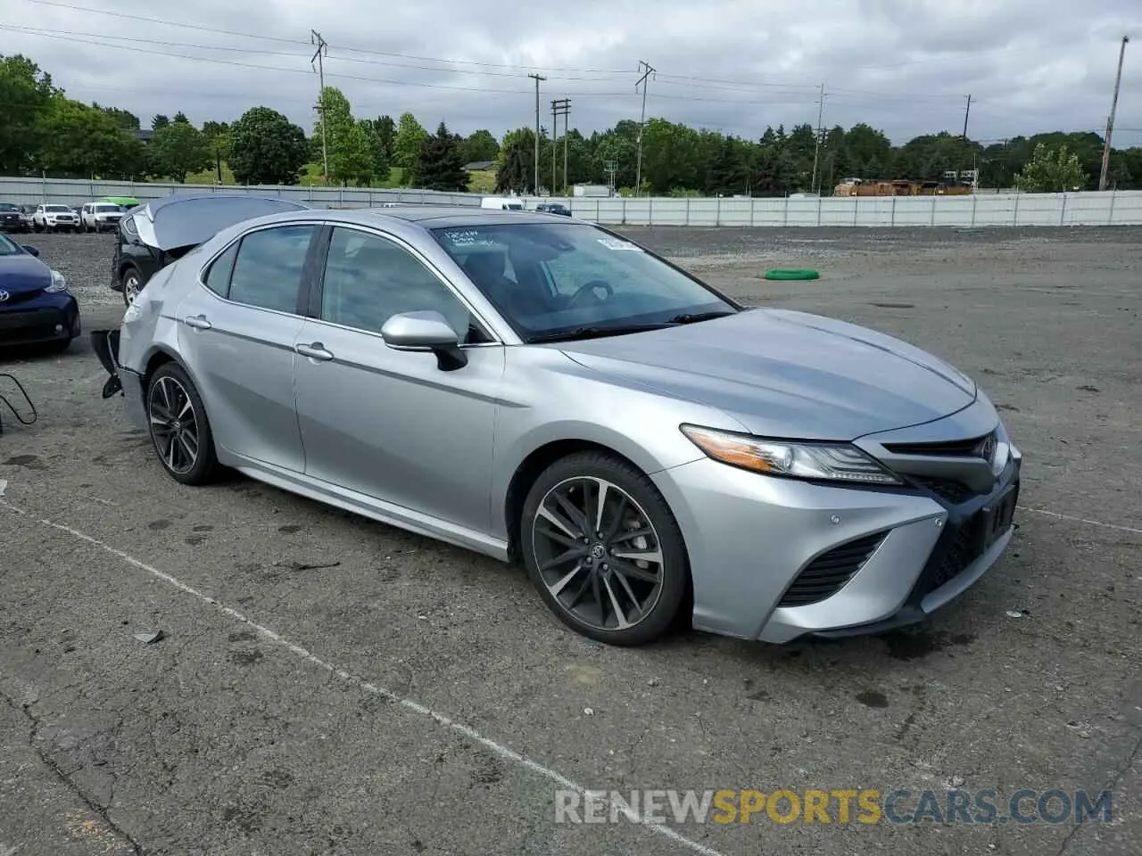 4 Photograph of a damaged car 4T1B61HK6KU760878 TOYOTA CAMRY 2019