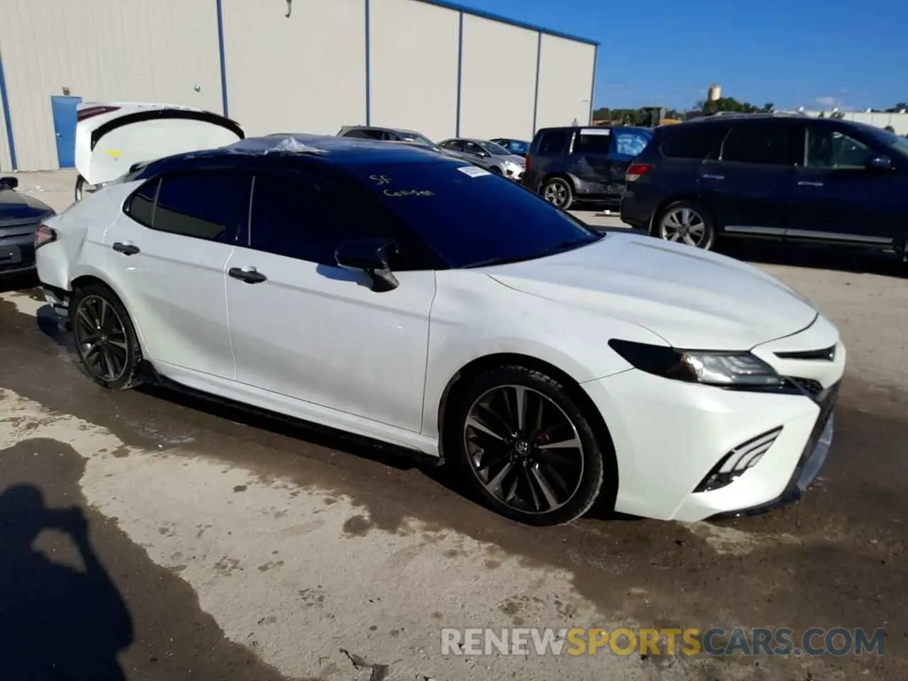 4 Photograph of a damaged car 4T1B61HK8KU184730 TOYOTA CAMRY 2019
