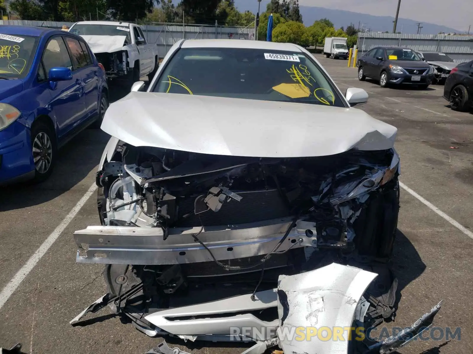 9 Photograph of a damaged car 4T1B61HK8KU715909 TOYOTA CAMRY 2019