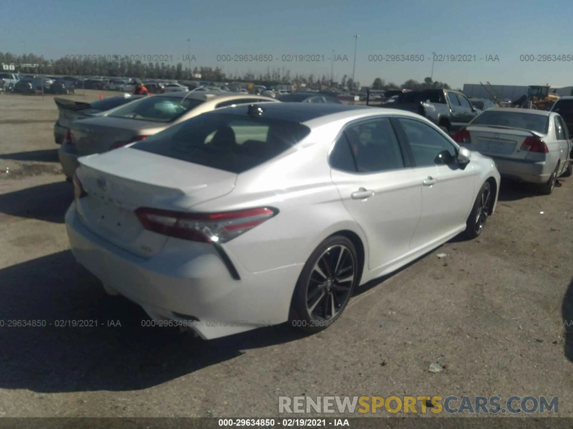4 Photograph of a damaged car 4T1B61HK8KU724917 TOYOTA CAMRY 2019