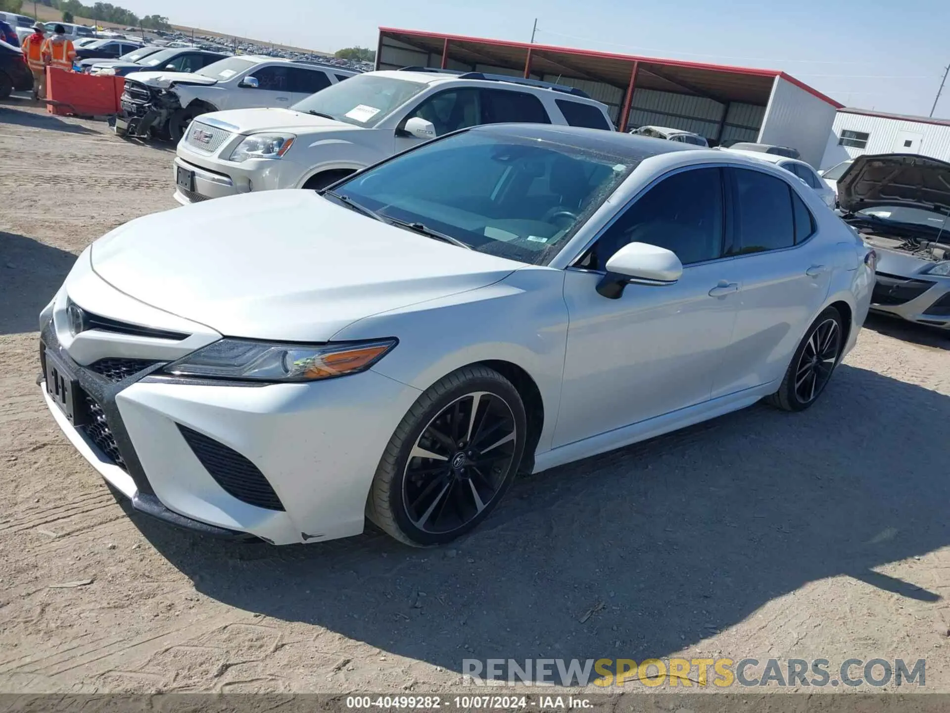 2 Photograph of a damaged car 4T1BZ1HK0KU032299 TOYOTA CAMRY 2019