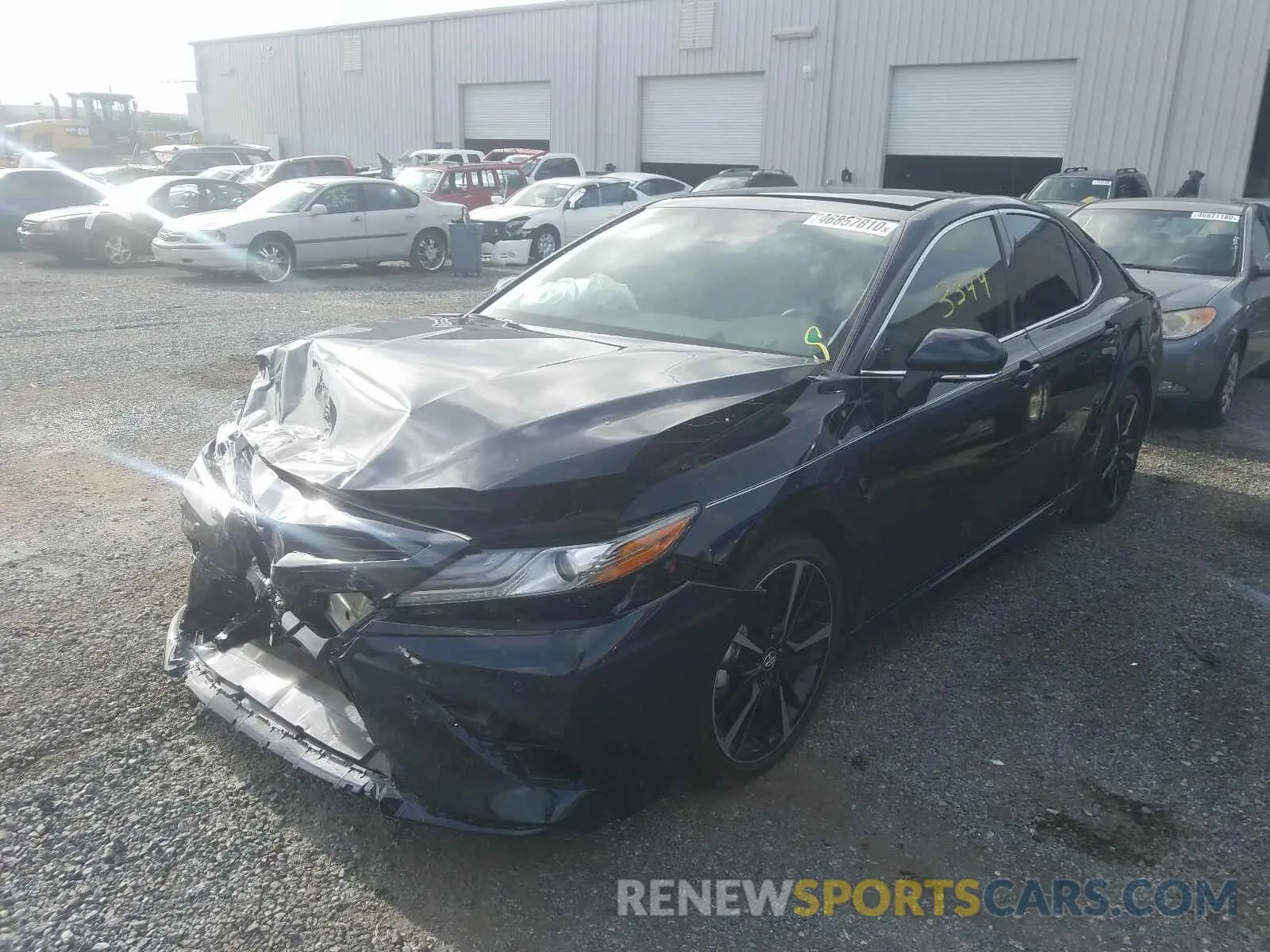 2 Photograph of a damaged car 4T1BZ1HK2KU028819 TOYOTA CAMRY 2019