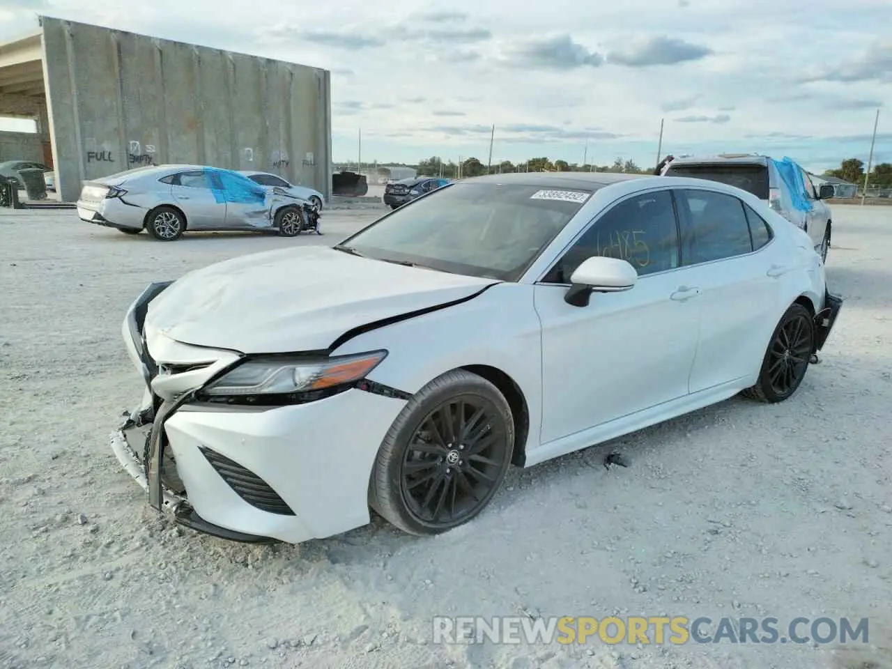 2 Photograph of a damaged car 4T1BZ1HK2KU031011 TOYOTA CAMRY 2019