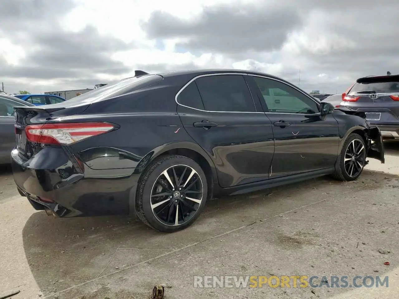 3 Photograph of a damaged car 4T1BZ1HK4KU028644 TOYOTA CAMRY 2019