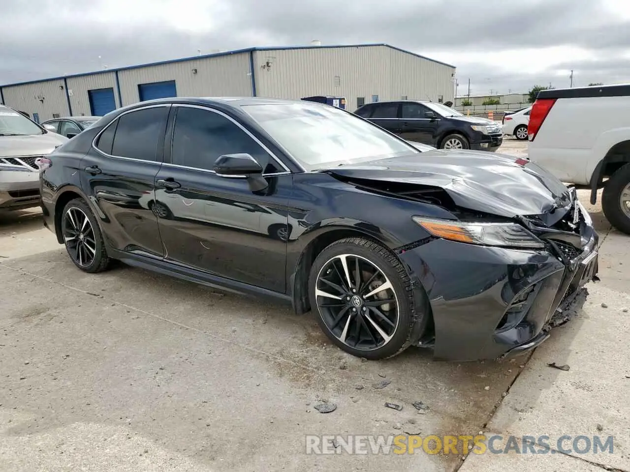 4 Photograph of a damaged car 4T1BZ1HK4KU028644 TOYOTA CAMRY 2019