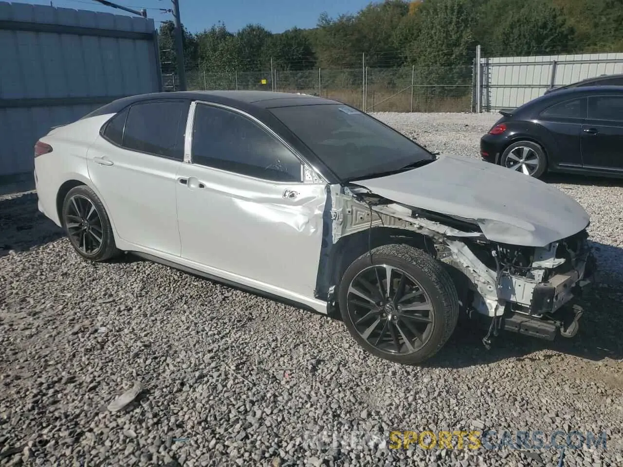 4 Photograph of a damaged car 4T1BZ1HK5KU032489 TOYOTA CAMRY 2019