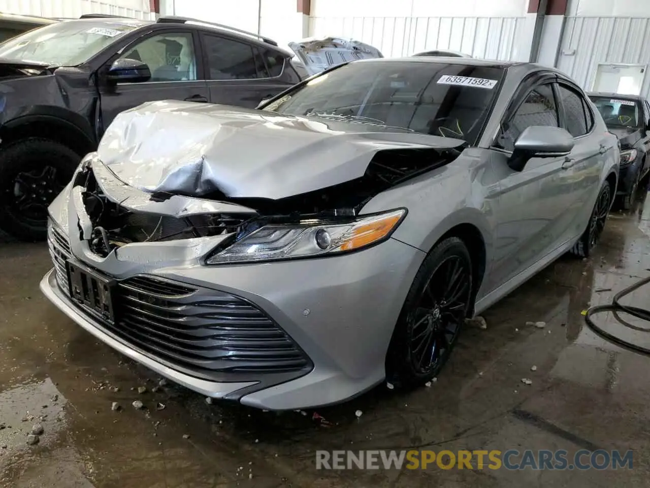 2 Photograph of a damaged car 4T1BZ1HK8KU022748 TOYOTA CAMRY 2019