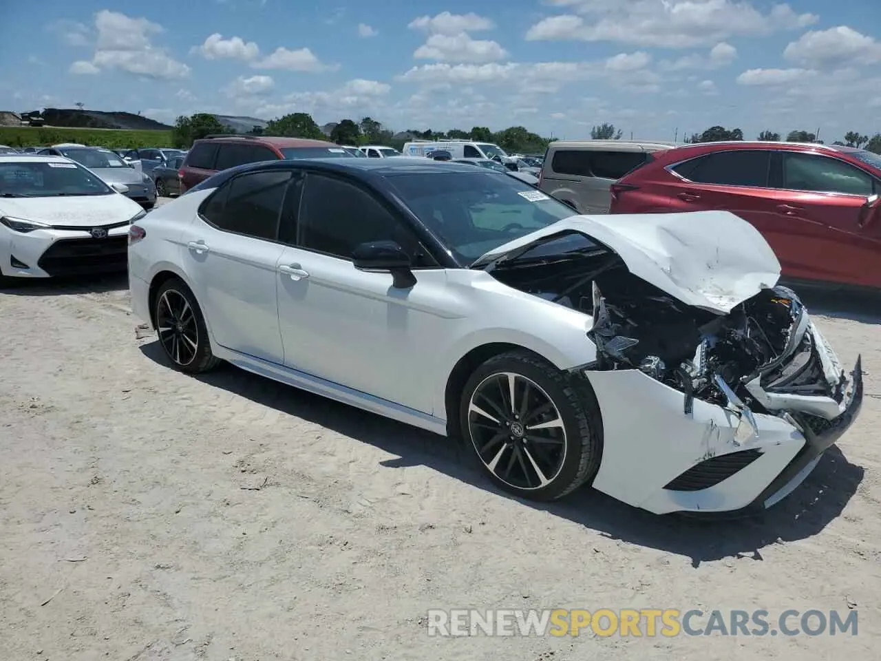 4 Photograph of a damaged car 4T1BZ1HK8KU026301 TOYOTA CAMRY 2019