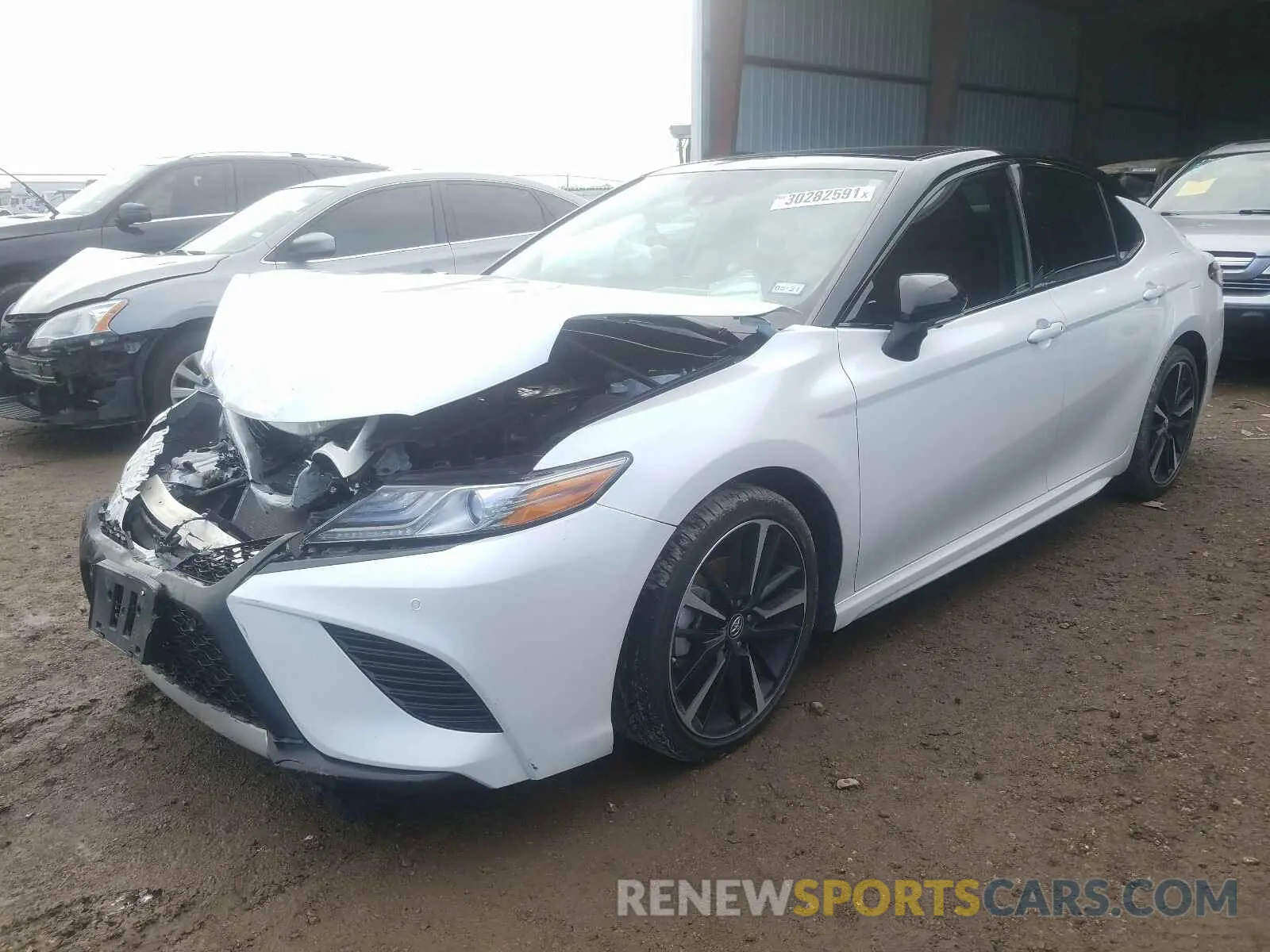 2 Photograph of a damaged car 4T1BZ1HK8KU027061 TOYOTA CAMRY 2019