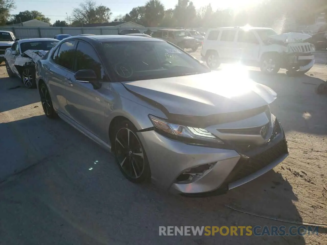 1 Photograph of a damaged car 4T1BZ1HKXKU022573 TOYOTA CAMRY 2019