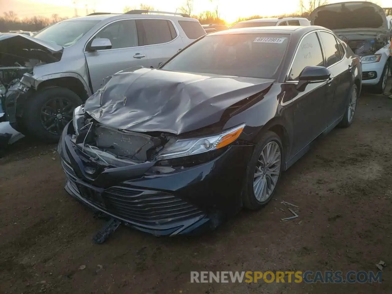 2 Photograph of a damaged car 4T1BZ1HKXKU030396 TOYOTA CAMRY 2019