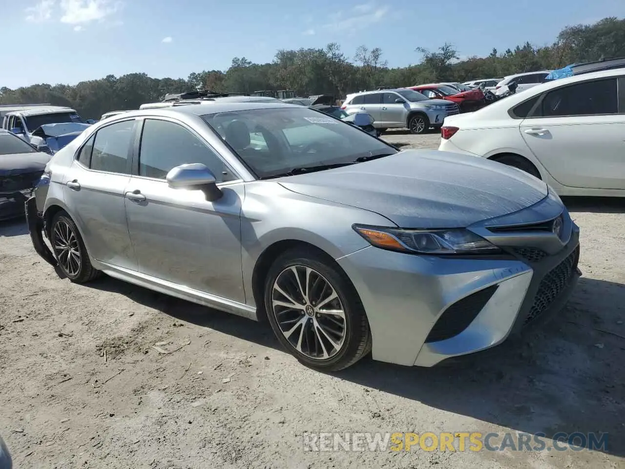 4 Photograph of a damaged car 4T1G11AK0LU995907 TOYOTA CAMRY 2020
