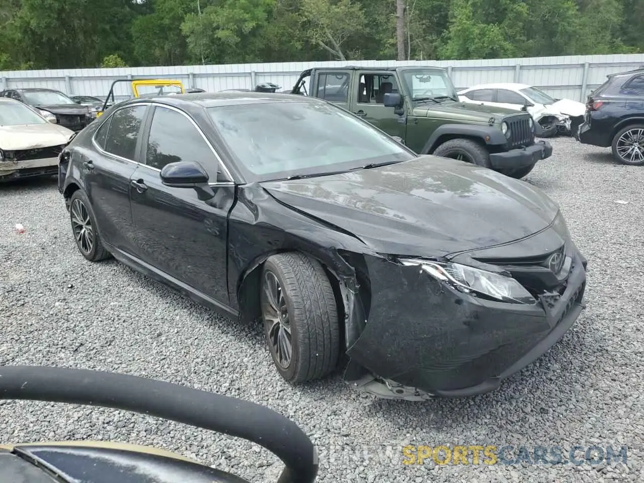 4 Photograph of a damaged car 4T1G11AK1LU360274 TOYOTA CAMRY 2020