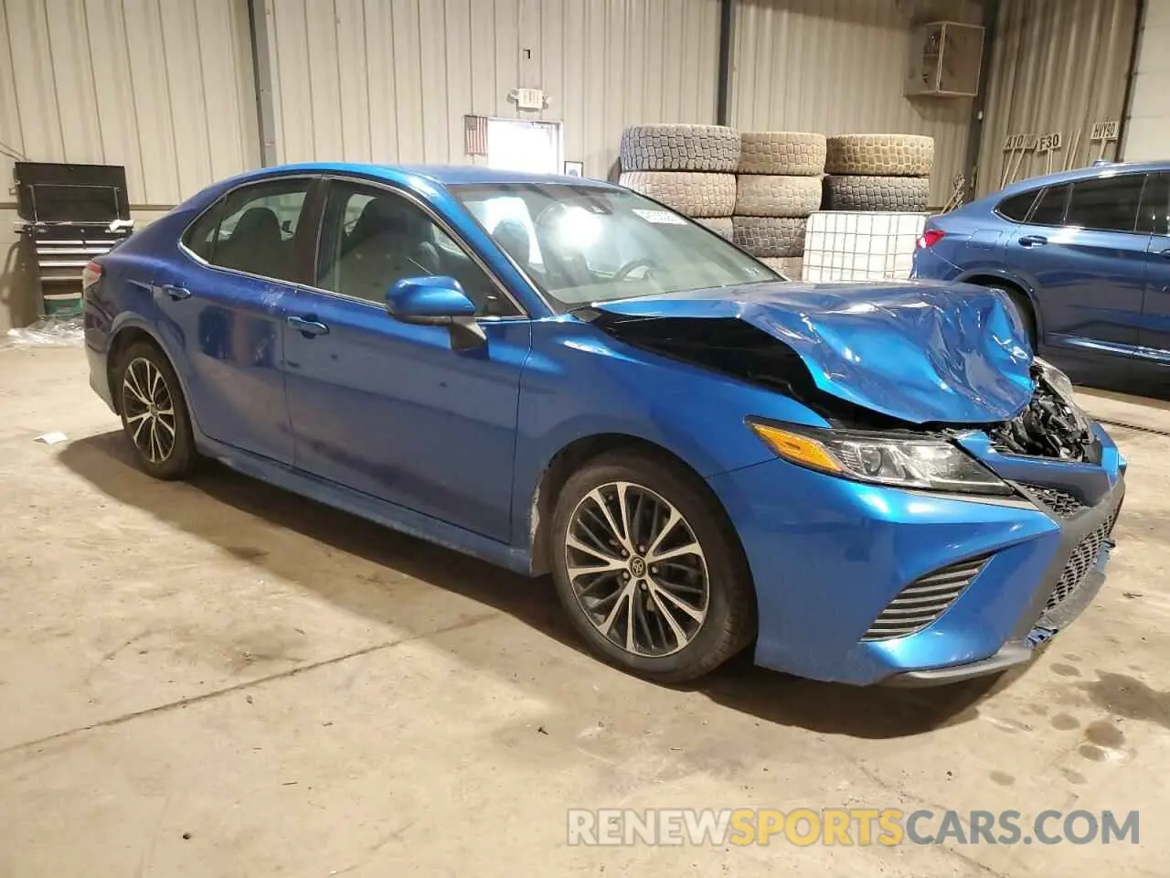 4 Photograph of a damaged car 4T1G11AK9LU353945 TOYOTA CAMRY 2020
