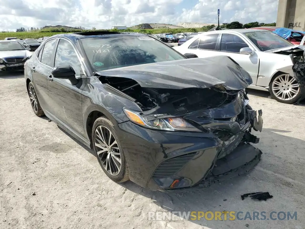 4 Photograph of a damaged car 4T1G11AK9LU508073 TOYOTA CAMRY 2020