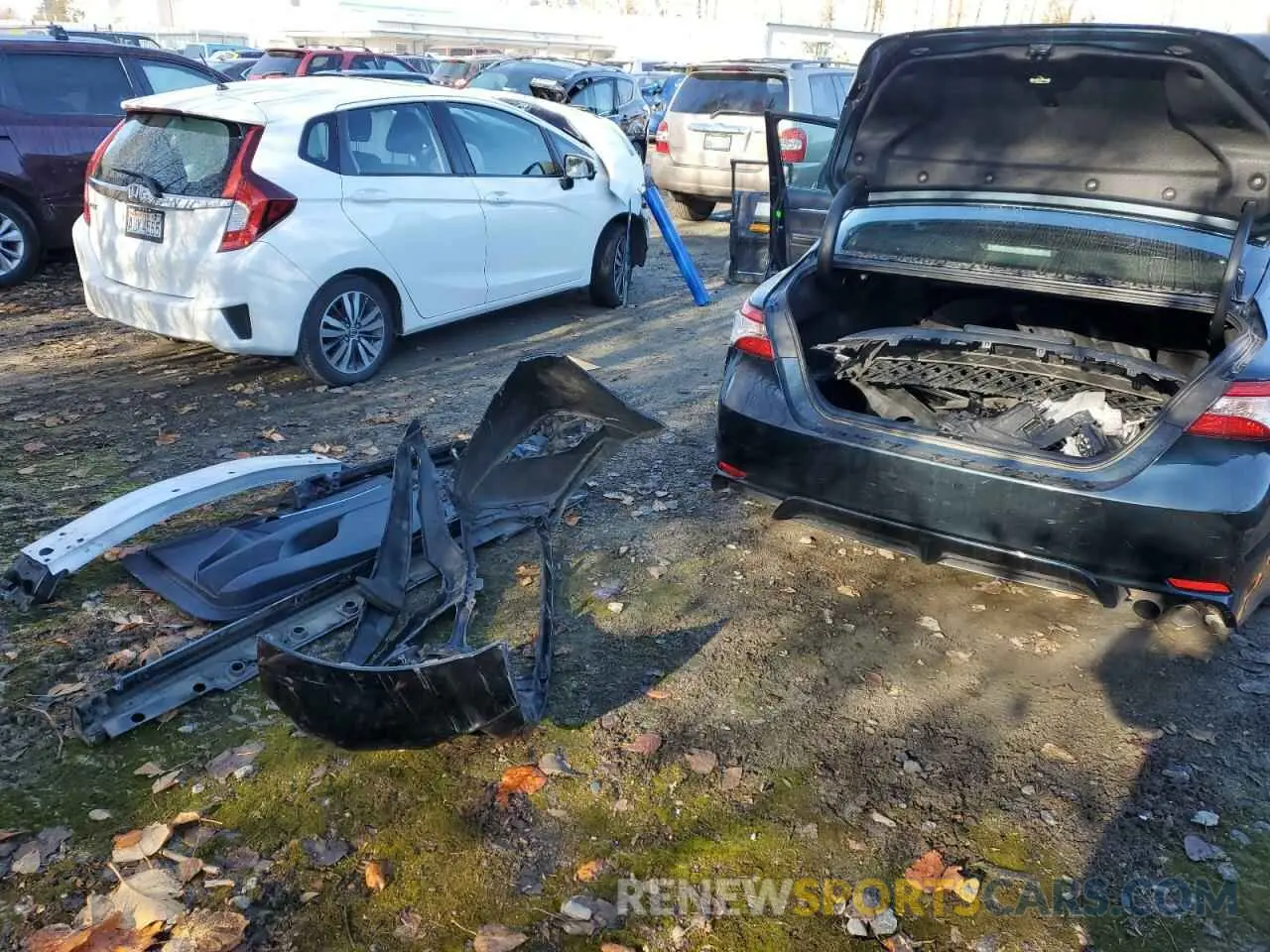 12 Photograph of a damaged car 4T1G11AKXLU931020 TOYOTA CAMRY 2020