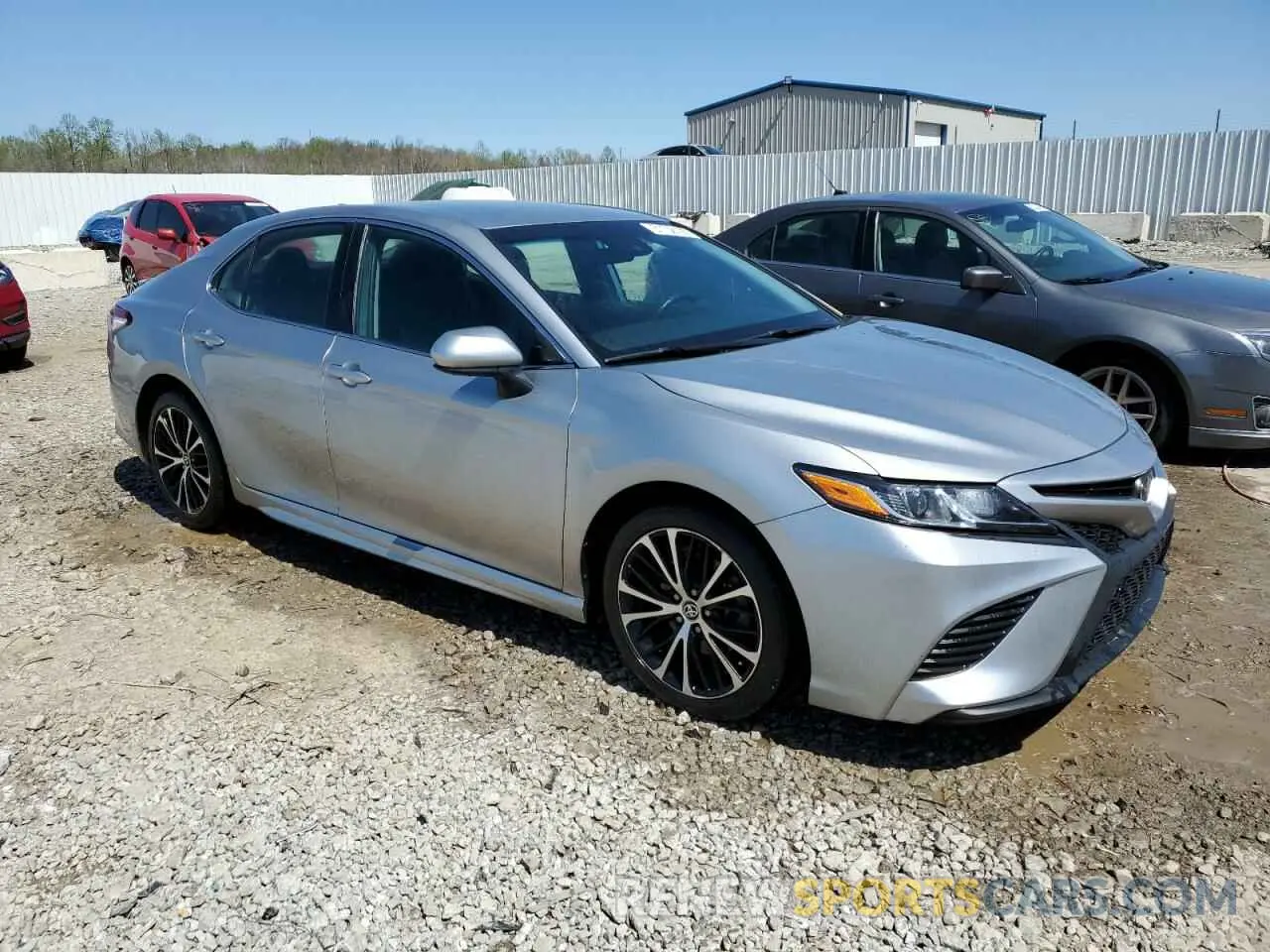 4 Photograph of a damaged car 4T1G11AKXLU950957 TOYOTA CAMRY 2020