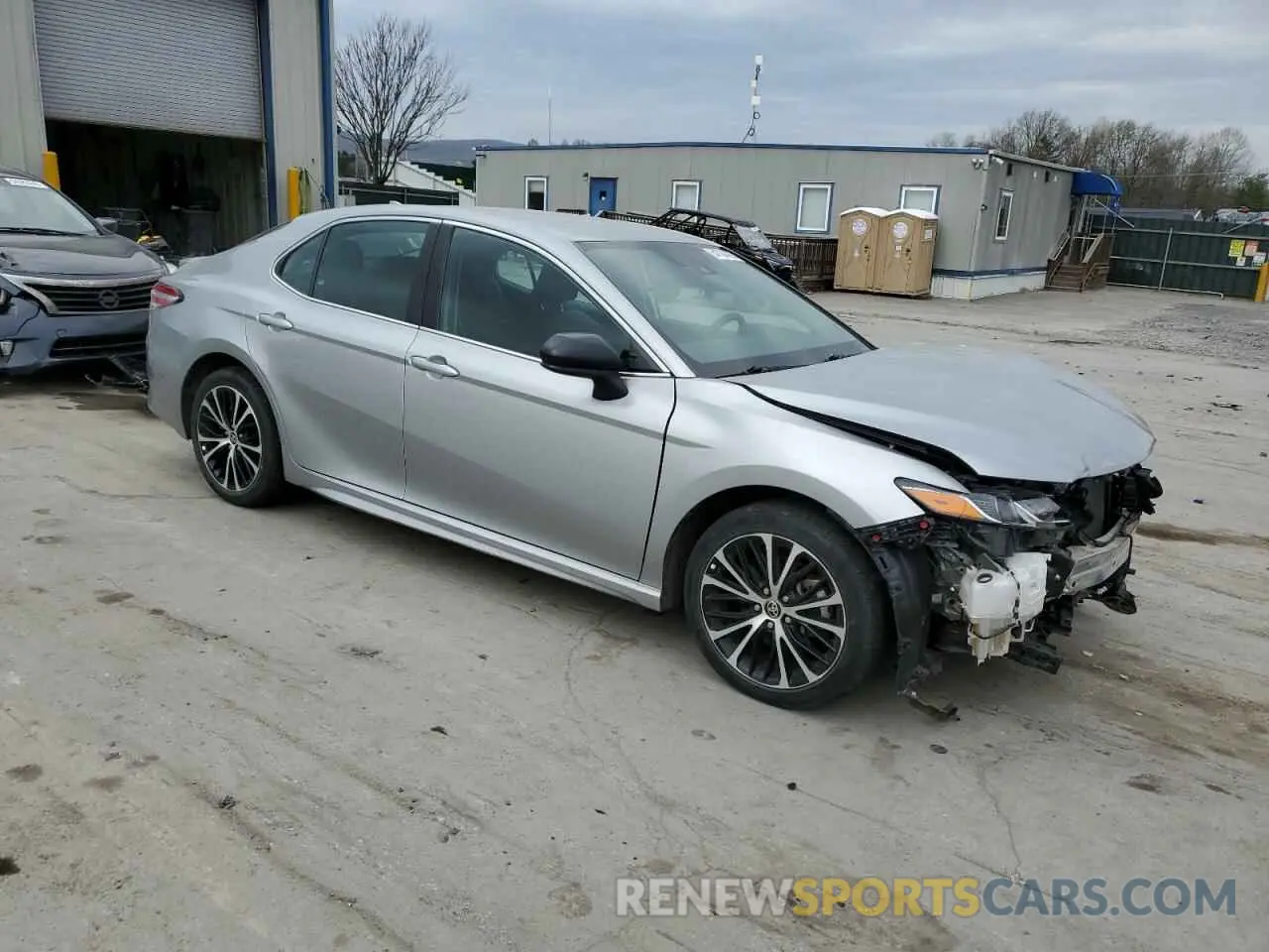 4 Photograph of a damaged car 4T1G11BK9LU019087 TOYOTA CAMRY 2020
