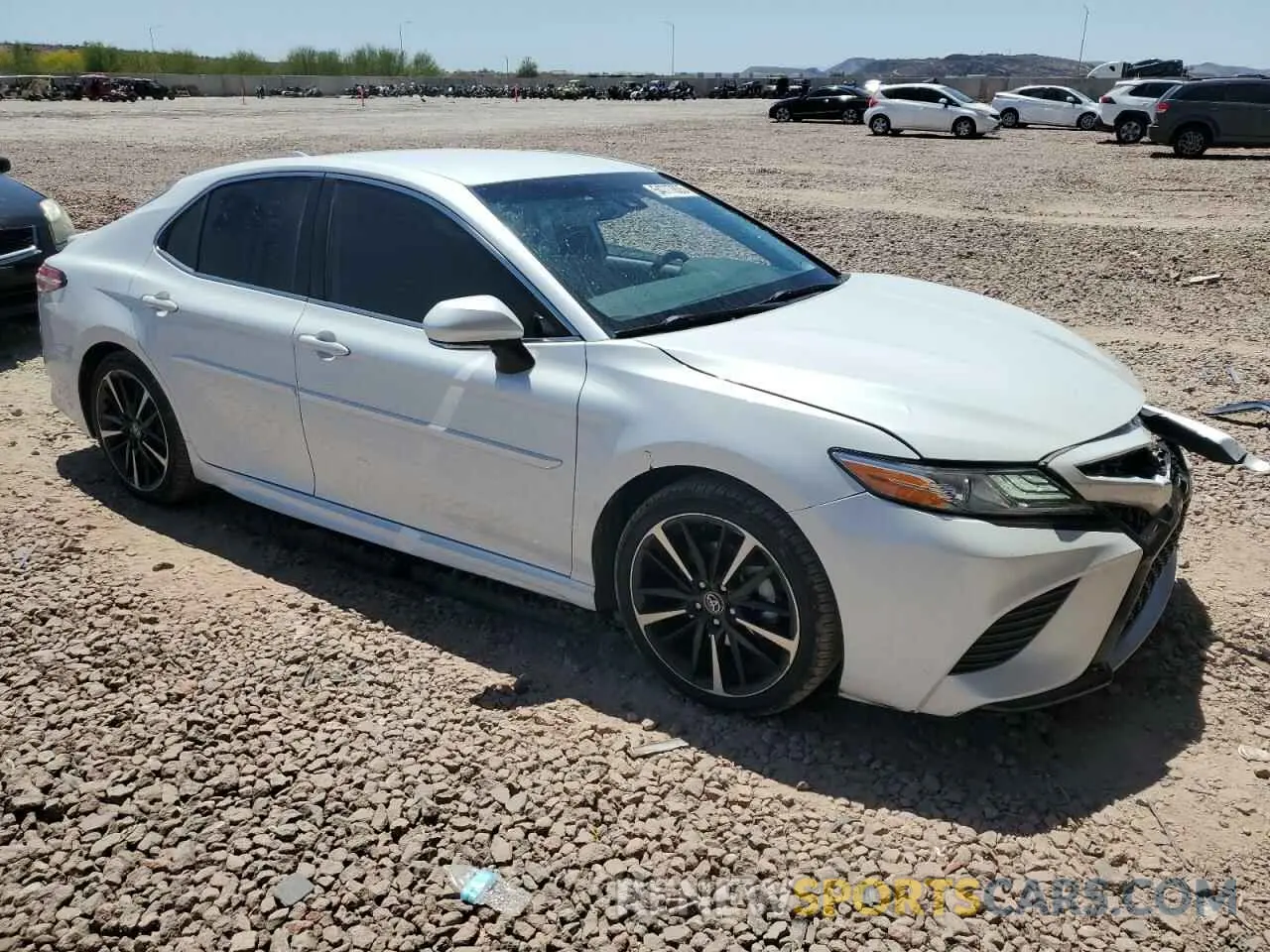 4 Photograph of a damaged car 4T1K61AK3LU940279 TOYOTA CAMRY 2020