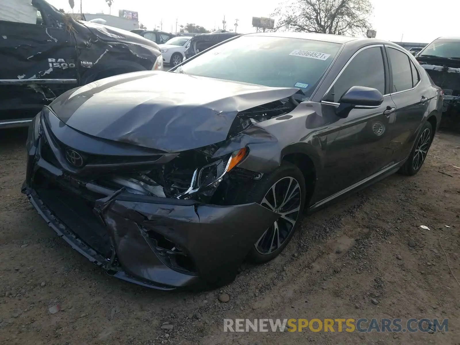 2 Photograph of a damaged car 4T1M11AKXLU925558 TOYOTA CAMRY 2020