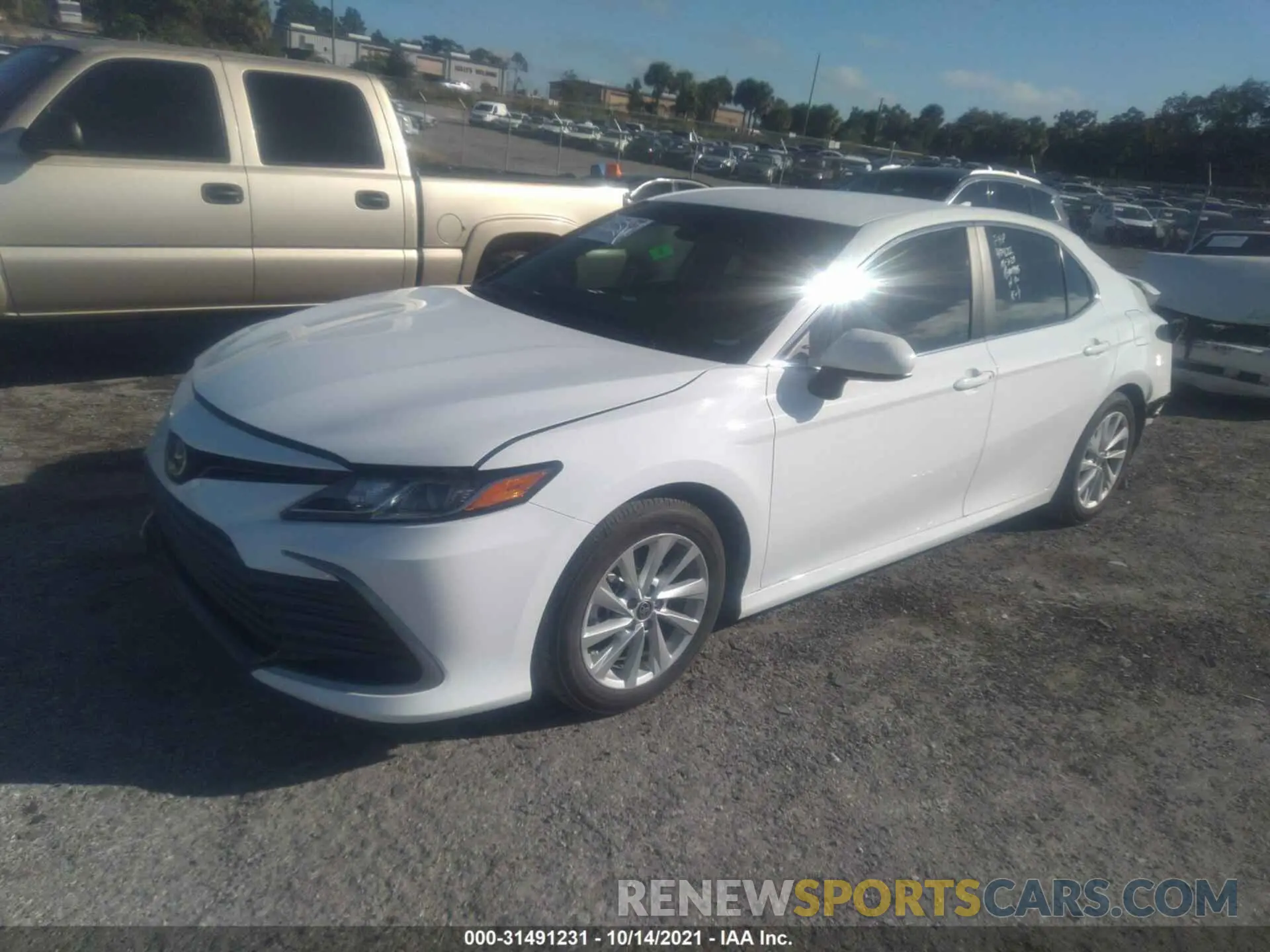 2 Photograph of a damaged car 4T1C11AK1MU581101 TOYOTA CAMRY 2021